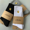 Vibrant Holiday Sock Packaging Featuring Unique Colorful Patterns