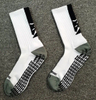 China Manufature Wholesale Custom Sports Grip Socks with Logo