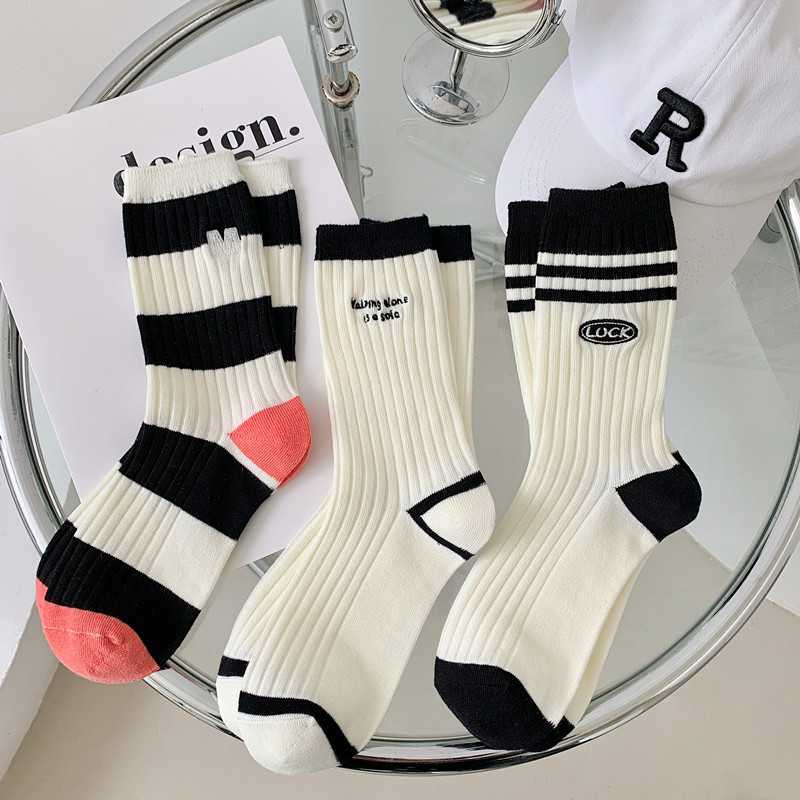Popular Item Black and White Socks women s Mid tube Socks Spring and Autumn Black Striped Stockings Outside Tidal Sports 