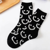 Socks Women′s MID-Calf Socks Smiley Cute Personality Ins Tide Black and White Colors Long Socks Sweet Cartoon Girls Sports Socks