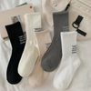 Women′s Autumn and Winter Simple Japanese Hundreds of Pile Socks High Couple Sports Long Socks