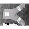 bulk buying of breathable mesh and women striped RA cycling socks suitable for racing sports cycling 