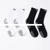 Wholesale winter solid color anti slip men soccer sport socks with exclusive grip logo for men