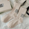 Women′s Autumn and Winter Simple Japanese Hundreds of Pile Socks High Couple Sports Long Socks
