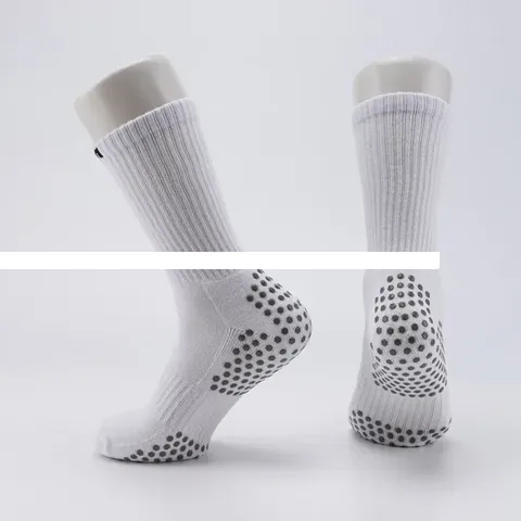 Wholesale winter solid color anti slip men soccer sport socks with exclusive grip logo for men
